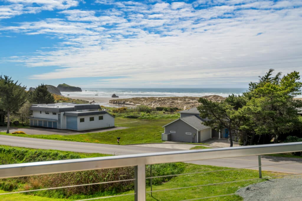 View over the Bandon Beach from the best hotel in Bandon, Oregon - a great place to stop on your Oregon Coast road trip