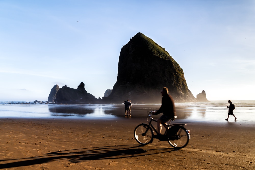 Biking on the Oregon Beaches - discover the best time of year to visit the Oregon Coast