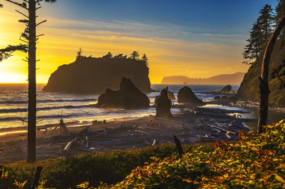 A sunset view at the rock shores of Bandon Beach in Oregon.