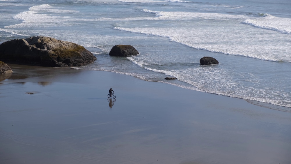 Coastal Mountain Biking in Bandon, Oregon 4 person enjoying mountain biking in Oregon on the coastal beaches near Bandon